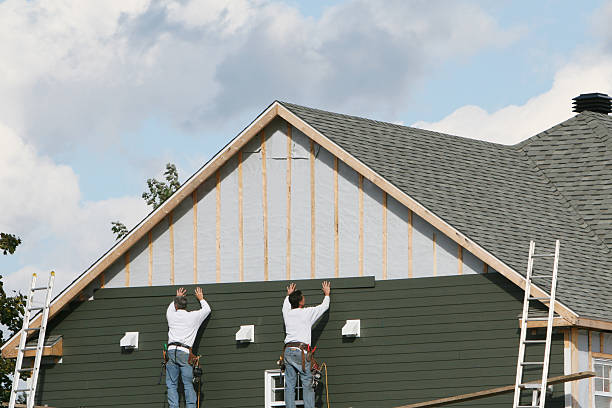 Professional Siding Installation technician working in Henderson, KY